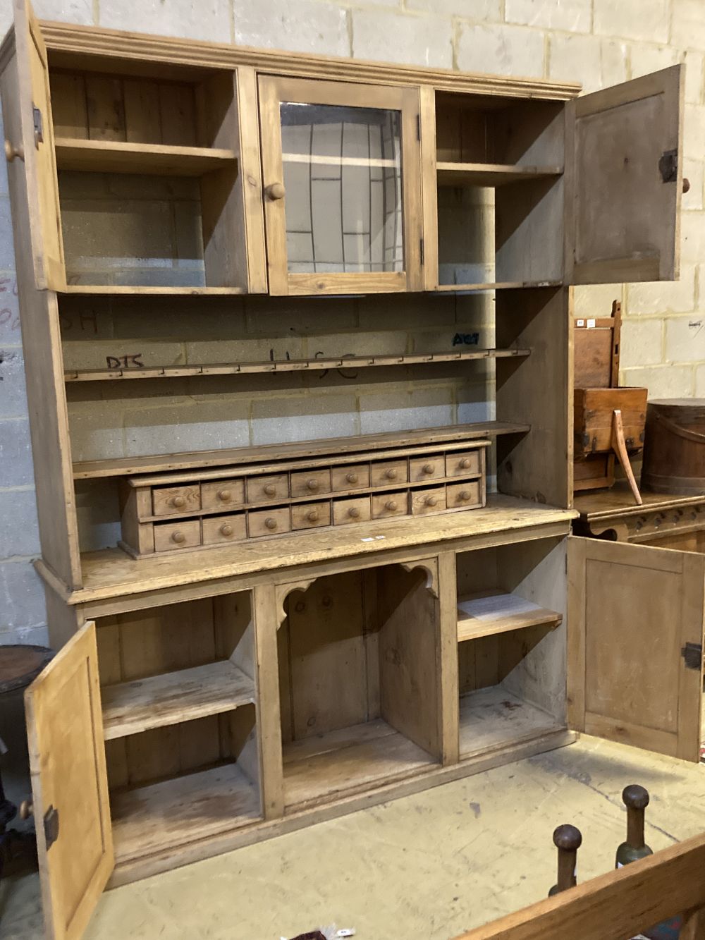 A large Victorian pine dresser, width 182cm depth 48cm height 240cm